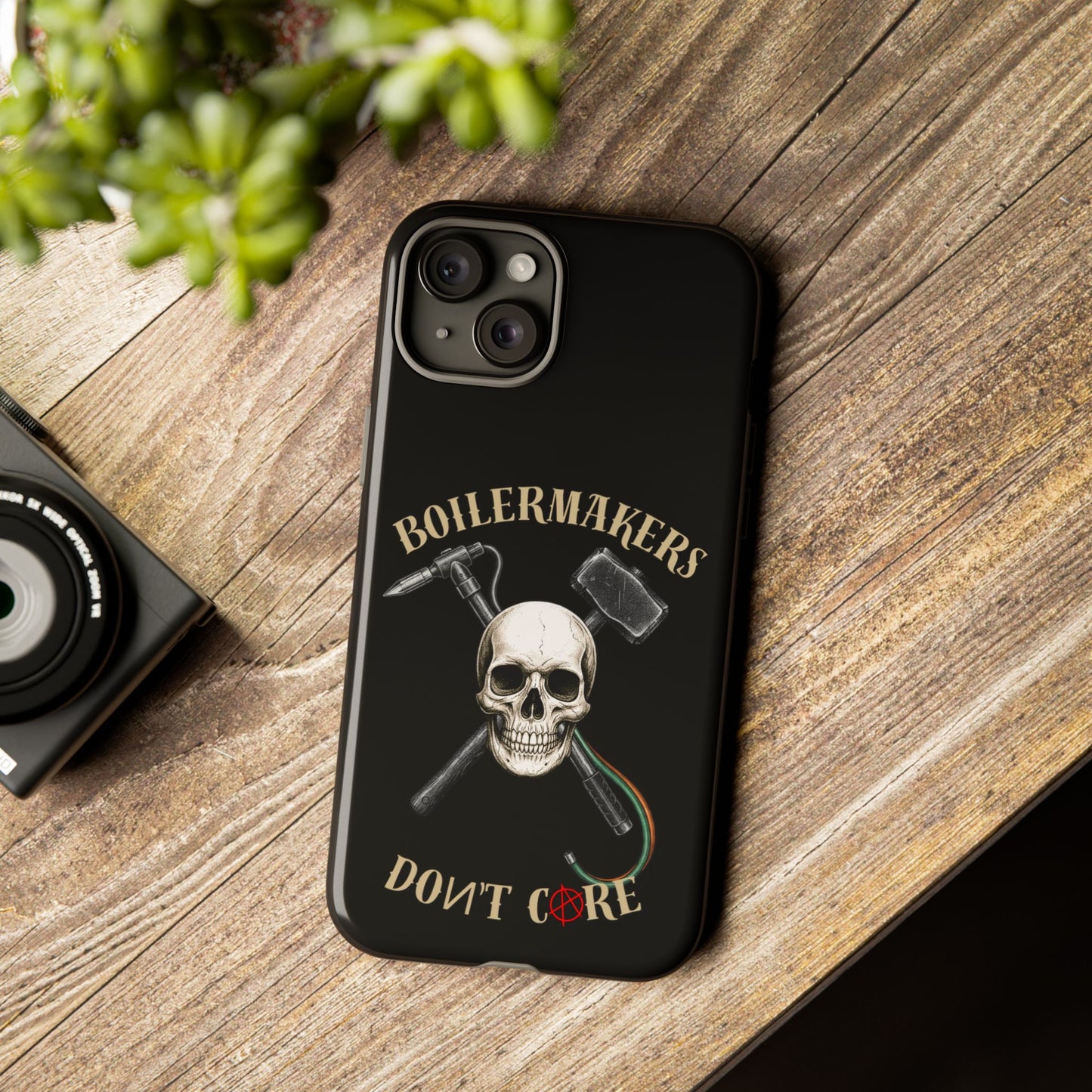 Boilermakers Don’t Care Tough Case — skull-and-hammer design, full-wrap protection built for the hard hands who keep the world running.