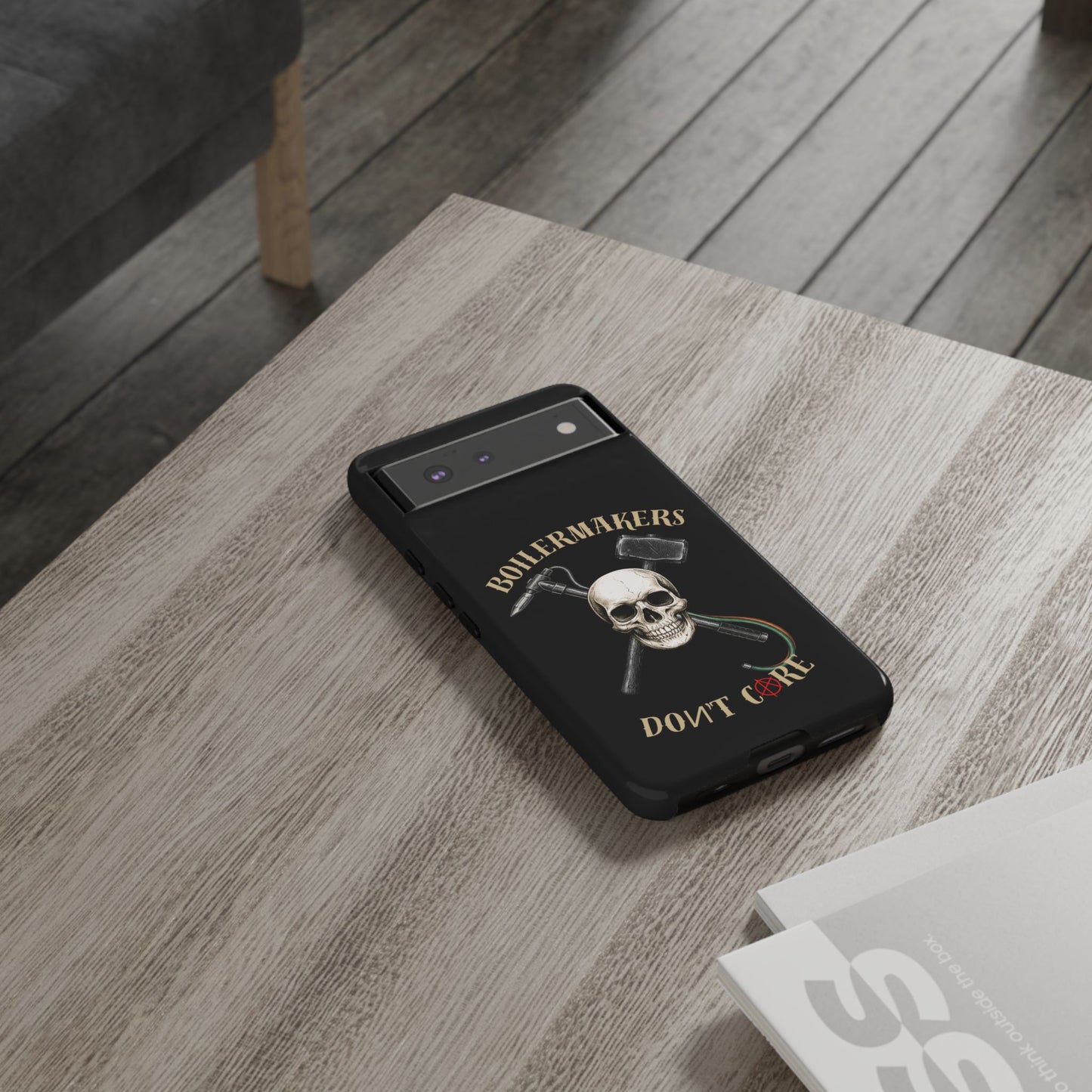 Boilermakers Don’t Care Tough Case — skull-and-hammer design, full-wrap protection built for the hard hands who keep the world running.
