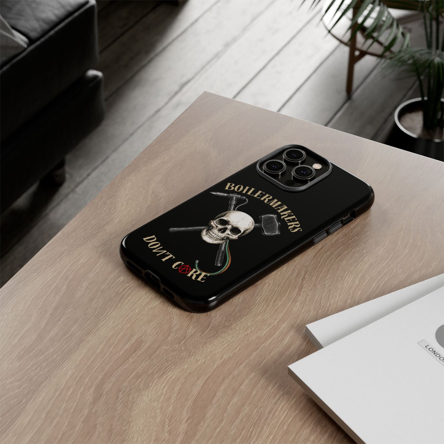 Boilermakers Don’t Care Tough Case — skull-and-hammer design, full-wrap protection built for the hard hands who keep the world running.