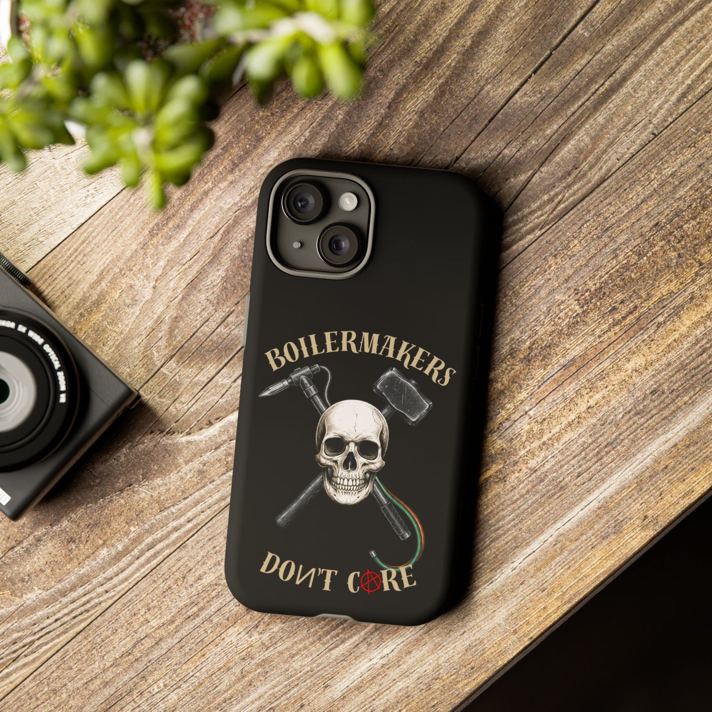 Boilermakers Don’t Care Tough Case — skull-and-hammer design, full-wrap protection built for the hard hands who keep the world running.