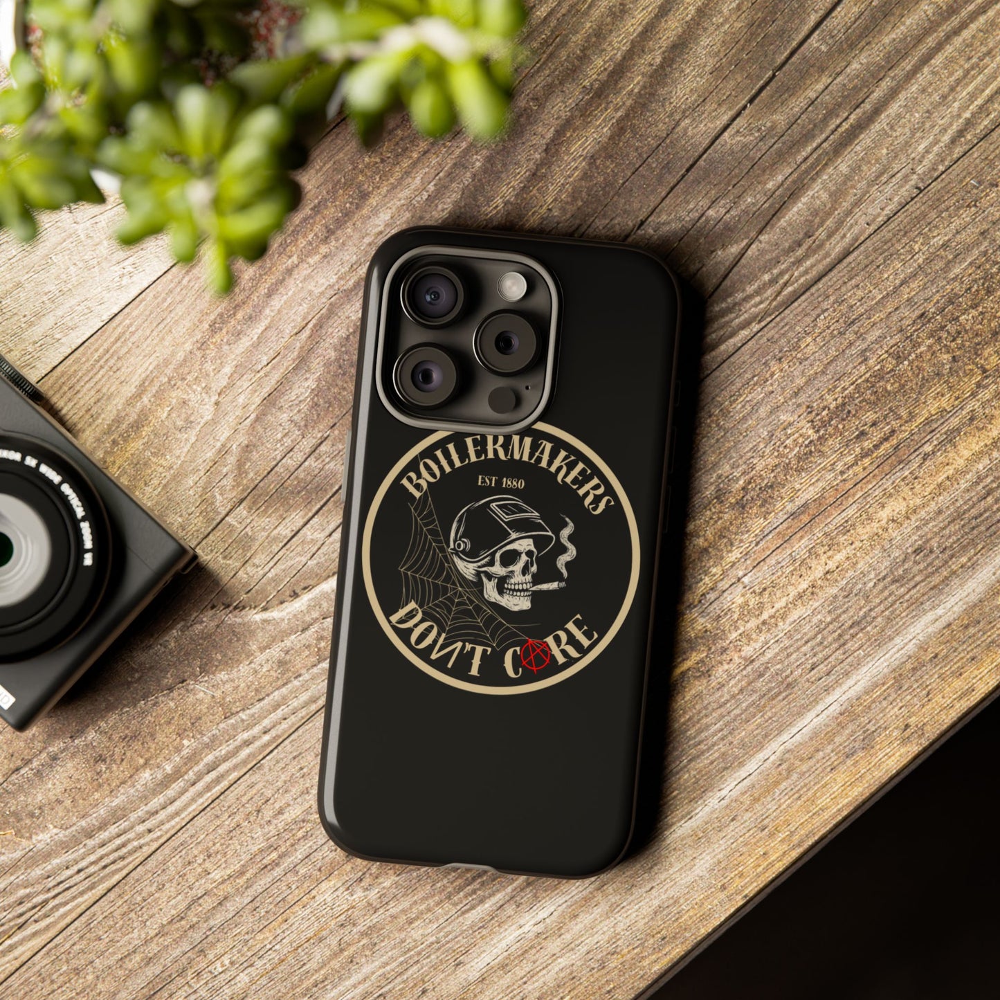Boilermakers Don’t Care Phone Case — full-wrap skull design, drop-tested protection with attitude. Built tough for the hands that make the world work.