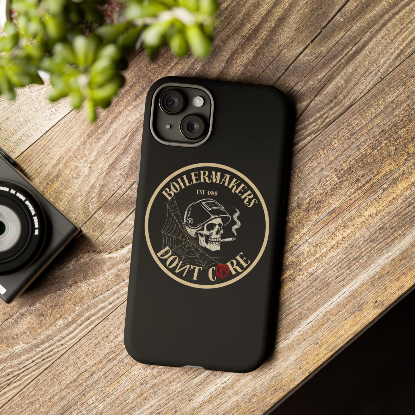 Boilermakers Don’t Care Phone Case — full-wrap skull design, drop-tested protection with attitude. Built tough for the hands that make the world work.