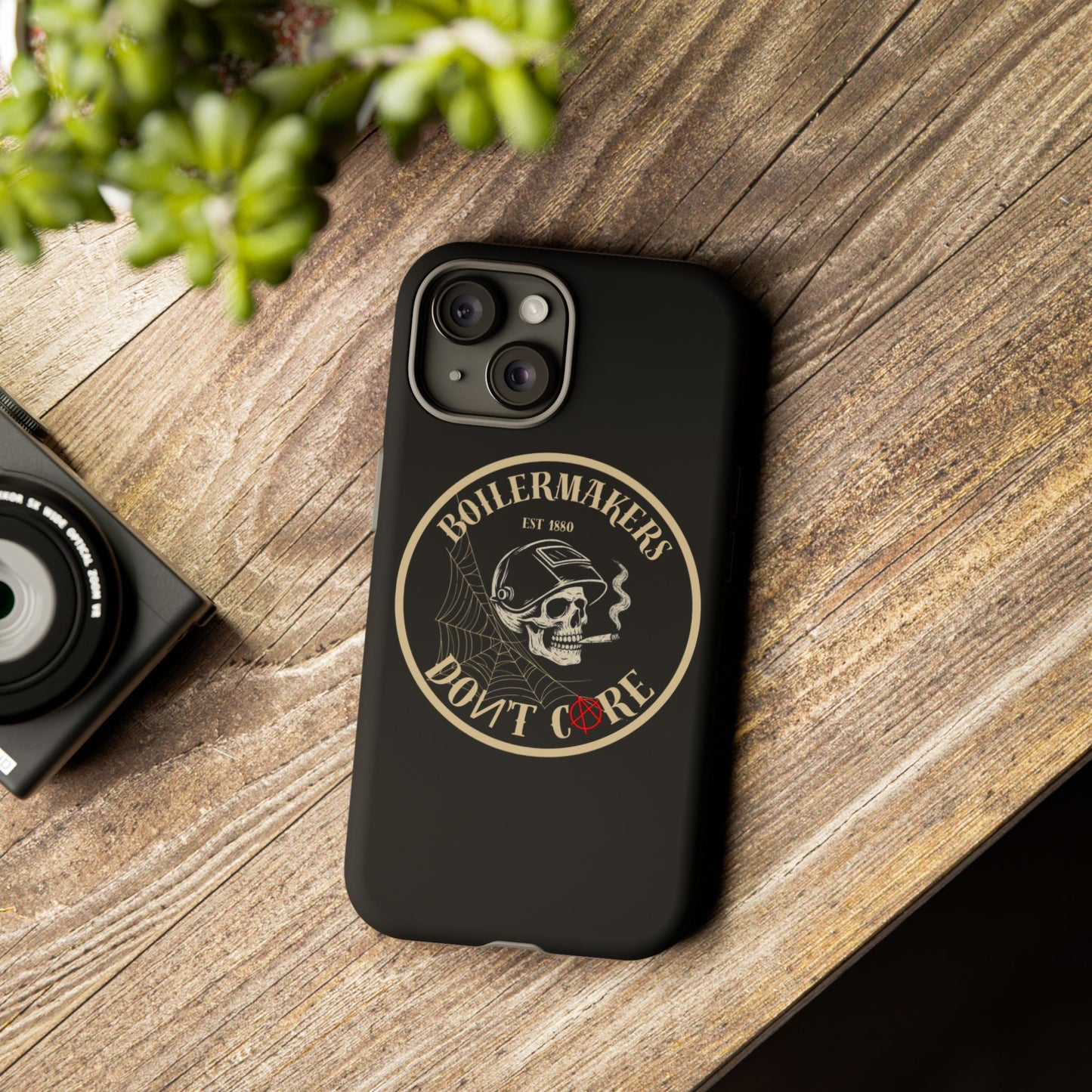 Boilermakers Don’t Care Phone Case — full-wrap skull design, drop-tested protection with attitude. Built tough for the hands that make the world work.