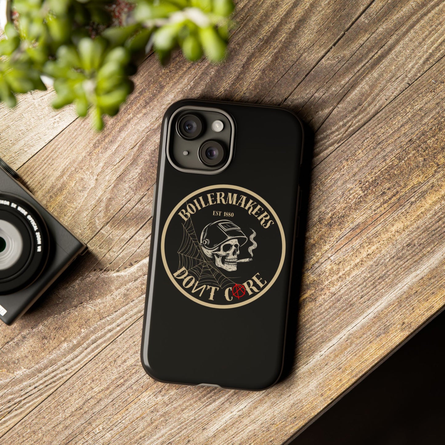 Boilermakers Don’t Care Phone Case — full-wrap skull design, drop-tested protection with attitude. Built tough for the hands that make the world work.
