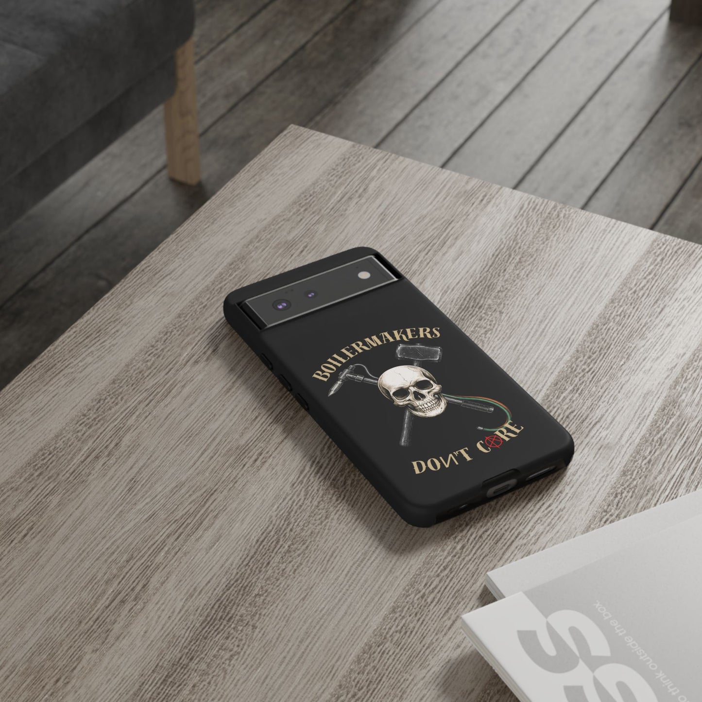Boilermakers Don’t Care Tough Case — skull-and-hammer design, full-wrap protection built for the hard hands who keep the world running.