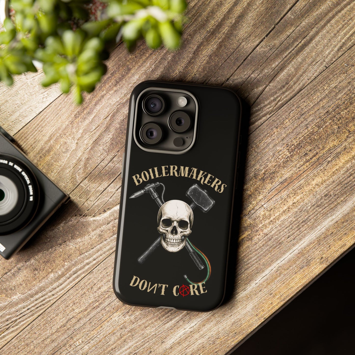 Boilermakers Don’t Care Tough Case — skull-and-hammer design, full-wrap protection built for the hard hands who keep the world running.