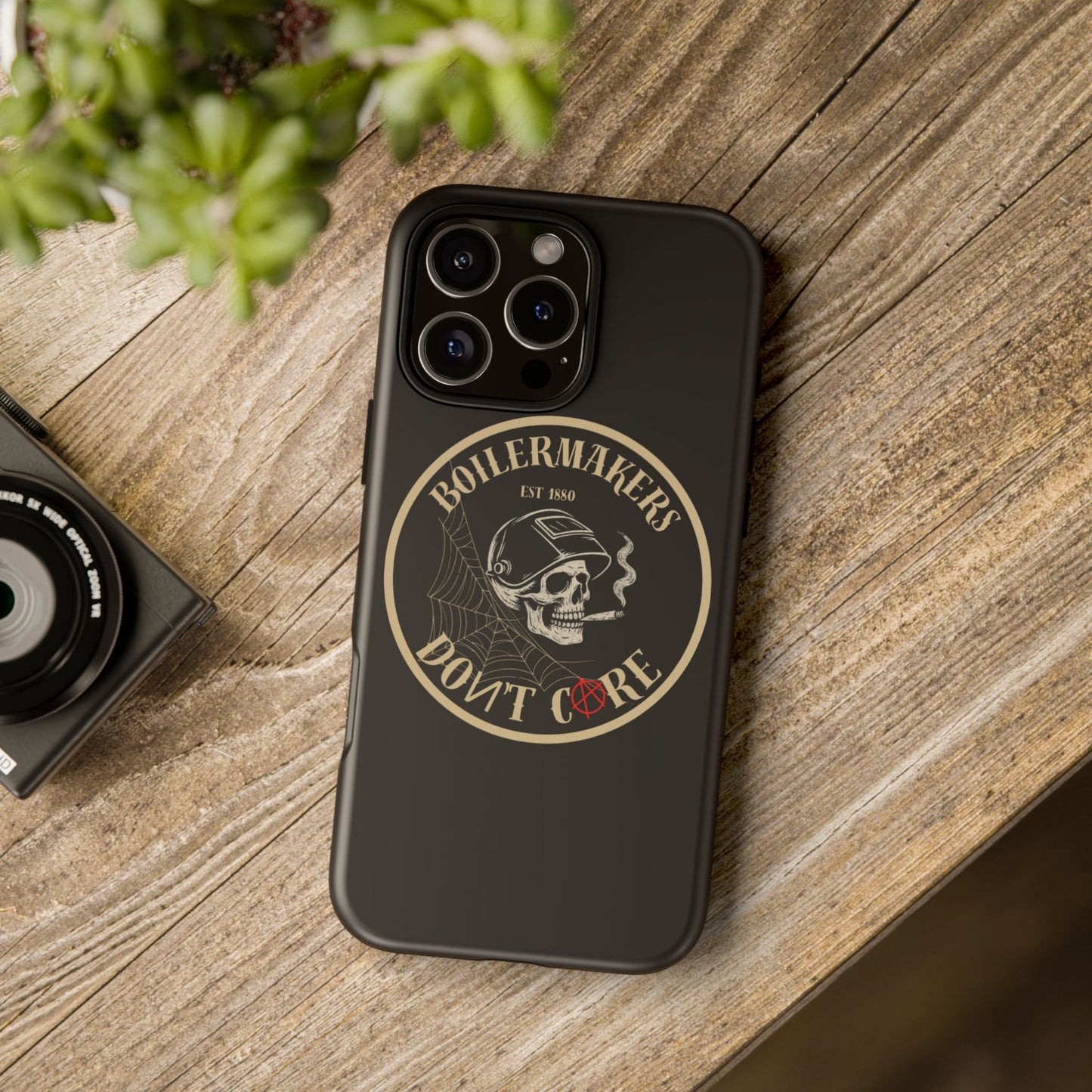 Boilermakers Don’t Care Phone Case — full-wrap skull design, drop-tested protection with attitude. Built tough for the hands that make the world work.