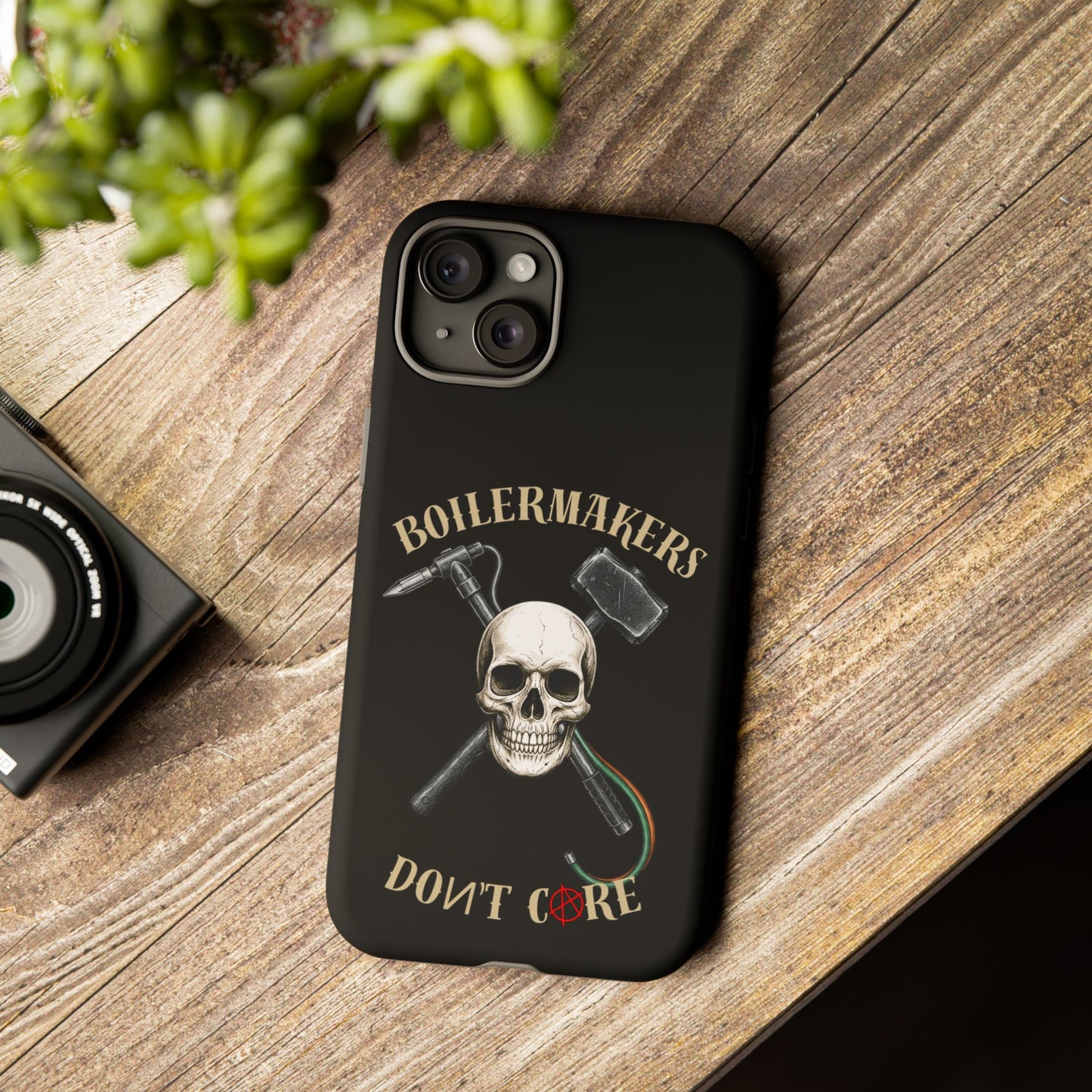 Boilermakers Don’t Care Tough Case — skull-and-hammer design, full-wrap protection built for the hard hands who keep the world running.