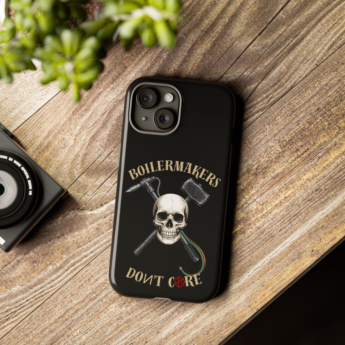 Boilermakers Don’t Care Tough Case — skull-and-hammer design, full-wrap protection built for the hard hands who keep the world running.